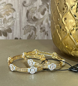 Oval Gold and Clear Bangles