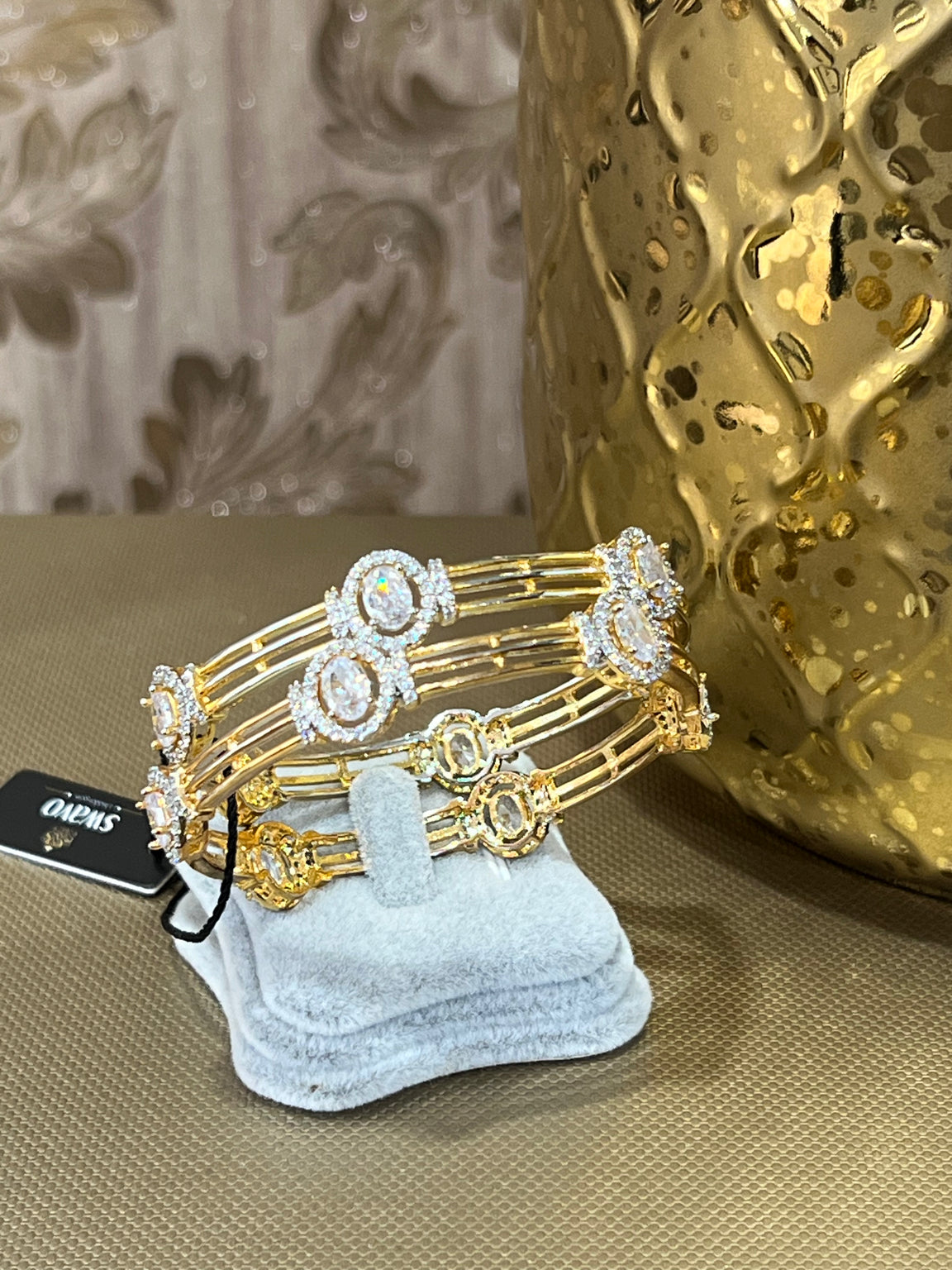 Oval Gold and Clear Bangles