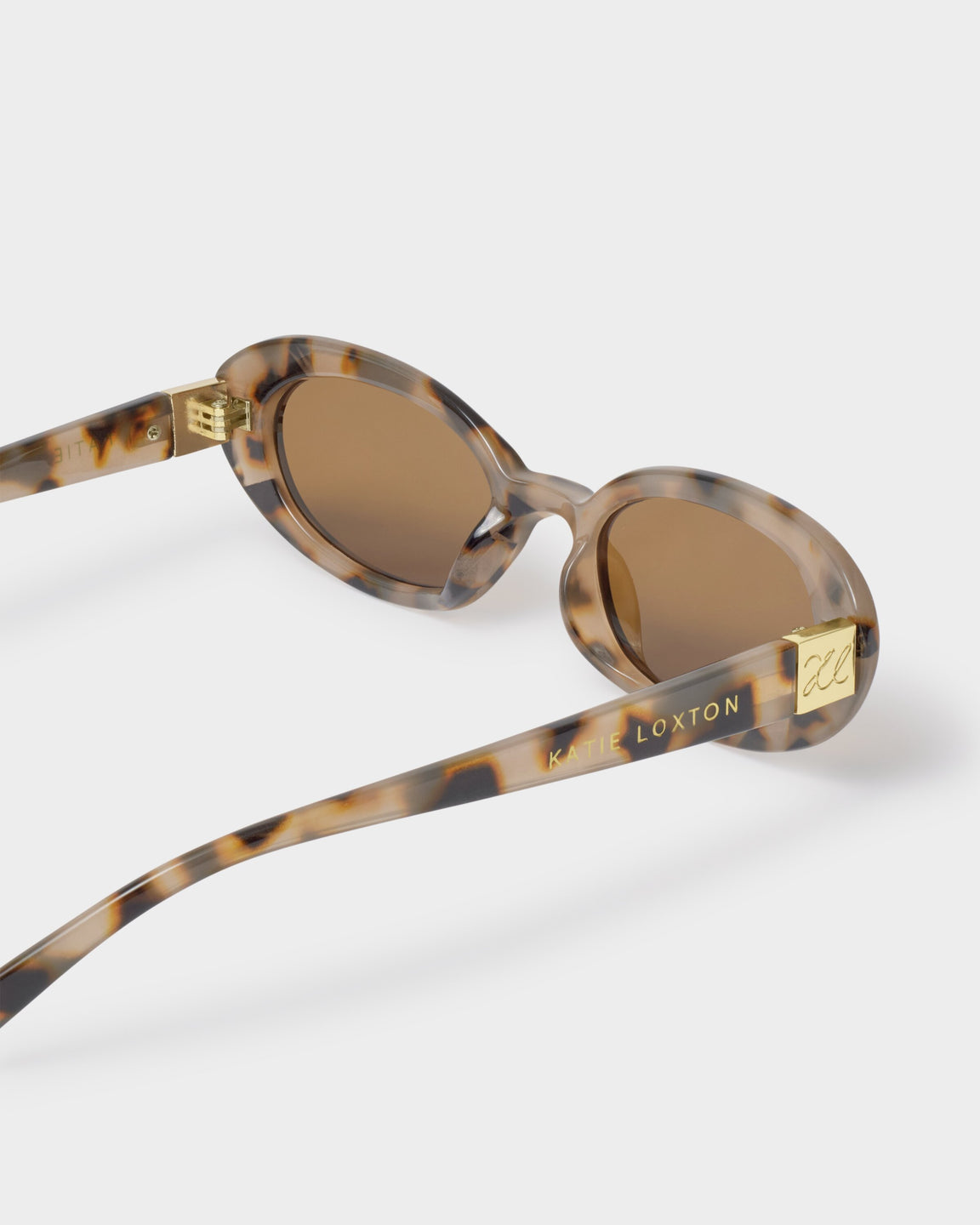 Katie Loxton Nissi Slim Oval Sunglasses In Light Tortoise Shell